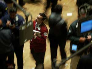 A trader rushes across the floor of the New York S 