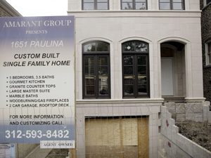 A sign advertises a new home for sale in the Buckt 