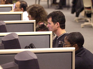 Jobseekers in Georgia at computer terminals. 
