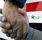Handshake with Iraqi flag 