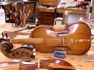 This violin dates back to the 1600s. Andrew Dipper had to make several pieces when restoring this instrument.