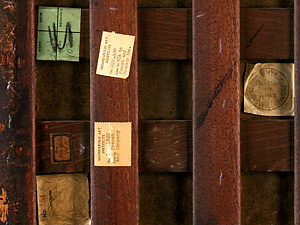 The back side of David Teniers' painting "The Prodigal Son" reveals a host of stamps and seals, tracing the paintings travels and a few of its many owners.