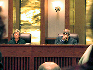 Justices Helen Meyer and Alan Page listen to the tobacco fee/tax arguments on April 11, 2006.