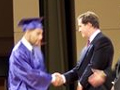 The graduation handshake