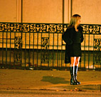 A female police officer poses as a prostitute. 