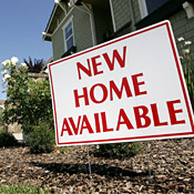 Newly-constructed homes sit unsold at a ... 