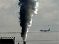 A chimney emits steam
