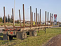 A logging truck trailer for sale