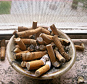 Cigarette butts in an ashtray 