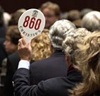 A bidder raises his paddle at Christie's ... 