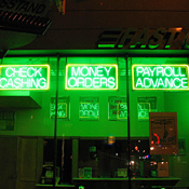 Store advertising "Check Cashing - Money ... 
