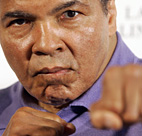 Boxing legend Muhammed Ali shadowboxes during ... 