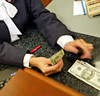http://images.publicradio.org/content/2007/01/31/20070131_bankteller_1158809_18.jpg