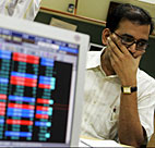 Stock trader looks concerned 