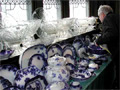 A collector pores over some of the items for sale