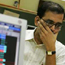 A broker looks worried.