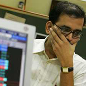A broker looks worried. 