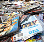 A pile of pirated CDs and DVDs. 