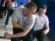 Recruit Charlie Anderson, left, spars with an academy classmate during defensive tactics training.