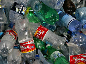 Bottles being loaded for recycling 