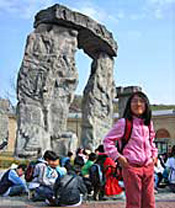Schoolchildren on a day trip gather at a ... 