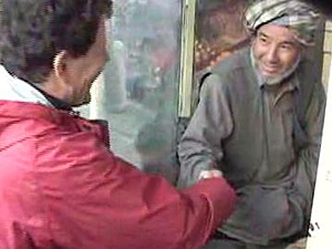 Nicholas Kristof meets baker Abdul Satar 