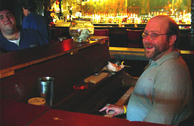 
                    Jim begins the early shift at Marie's Crisis with a mean rendition of "Moon River."
                                            (Kevin T. Allen)
                                        