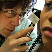 Doctor examines patient 