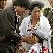 Bolivian President Evo Morales greets a young ... 