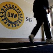A Delphi worker leaves a meeting at the UAW ... 