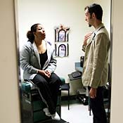 Dr. Ethan Brackett examines Cristina Valdez at ... 