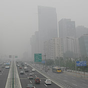 Haze cloaks the skyline in central Beijing today. 