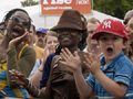 A crowd enjoys music