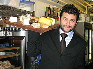Fromager Adrian Murcia poses with his cheese 