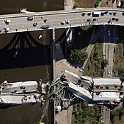 A collapsed section of the I35-W bridge in ... 