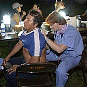 A Mexican farm worker gets a check-up from an ... 