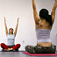 People participating in a yoga class