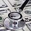 Stethoscope lying on money