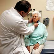 Dr. Ausberto Bianchi checks Ofelia Perez ... 