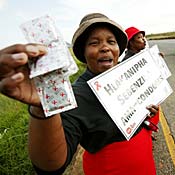 South African women pass out condoms and ... 