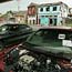 Cars flooded in Hurricane Katrina are gathered ...