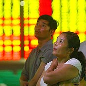Wary Chinese investors in Chongqing view stock ... 
