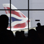 Passengers queue at London's Heathrow airport.