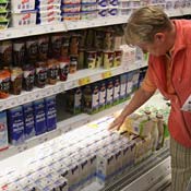 Customer looks over groceries 