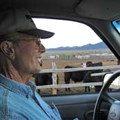 Dean Baker drives his 12,000-acre ranch in northeast Nevada.