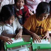 Cambodian children using low-cost laptop 