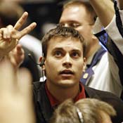 A bond trader signals an offer. 