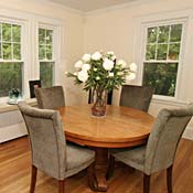 Note the glass bowl of glass balls. That's something a family with children could never practically leave there, but staging creates an idealized version on living, not a practical one.