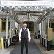 A wider shot of doorman Stephen Blum outside of his workplace, the Willard Intercontinental, 'cause hey -- it's a nice shot!