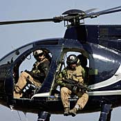 Blackwater security personnel in helicopter 